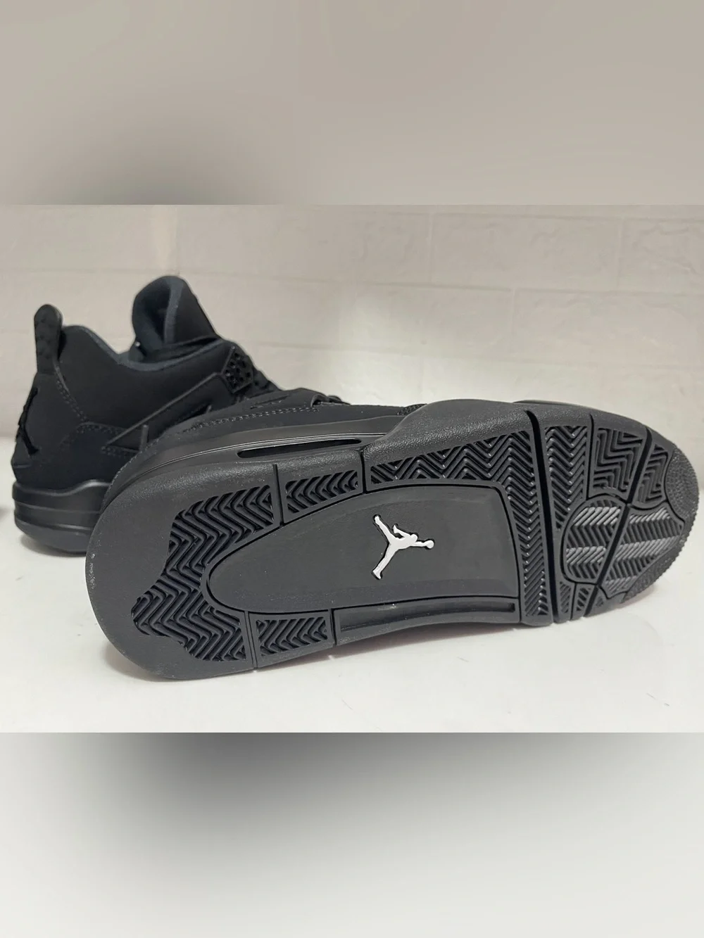 Air Jordan 4 All-Black Retro Basketball Sneaker